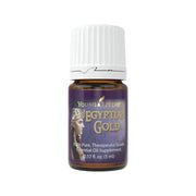 Young Living Egyptian Gold bottle with devotional aroma enhances meditation ambiance.