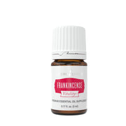 Young Living Frankincense Vitality bottle close-up for aromatherapy and skin health.