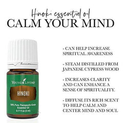 Hinoki essential oil close-up highlighting woodsy notes for meditation.