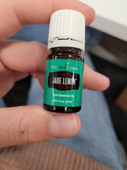 Young Living Jade Lemon bottle with diffuser scene for ambience