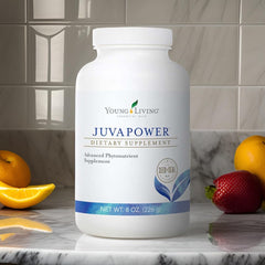 Young Living JuvaPower scoop-and-powder image suggests easy daily mixing in beverages.