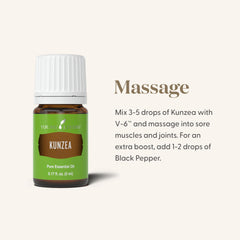 Young Living Kunzea essential oil drops on hand for topical use.