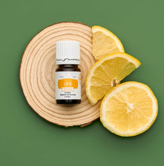 Young Living Lemon Vitality dropper close-up for precise culinary flavor.