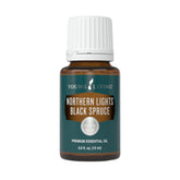 Young Living Northern Lights Black Spruce 15ml bottle with a calming, earthy scent.