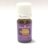 Young Living Palo Santo oil bottle with woodsy aroma ideal for grounding meditation.