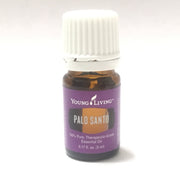 Young Living Palo Santo oil bottle with woodsy aroma ideal for grounding meditation.