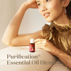 Young Living Purification 5ml bottle pour illustrates easy diffusion for airy spaces