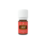 Young Living Raven essential oil bottle close-up for calming ambience.