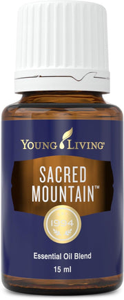 Young Living Sacred Mountain bottle pour showing diffuser-ready aroma