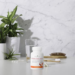 Close-up of Super Cal Plus capsules highlighting easy-to-swallow daily use.