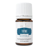 Young Living Thyme Vitality 5ml bottle pour, unleashing bold culinary flavor.