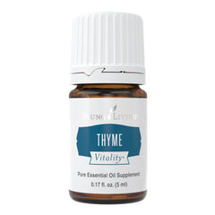 Young Living Thyme Vitality 5ml bottle pour, unleashing bold culinary flavor.