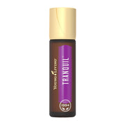 Young Living Tranquil roll-on bottle on desk promotes focused calm.