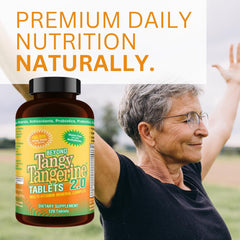 Youngevity Beyond Tangy Tangerine 2.0 tablets in hand for a simple routine.