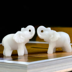 Ytbeoxk white jade elephant on a desk setup for natural decor and focus.