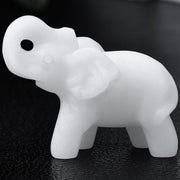 Ytbeoxk white jade elephant figurine close-up showing smooth finish and calming desk presence.