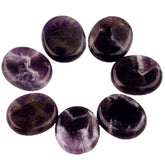 YWG Stone Amethyst palm stone closeup for meditation and calm focus
