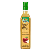 Zandu Organic Apple Cider with Mother in bottle on counter, ideal for dressings.