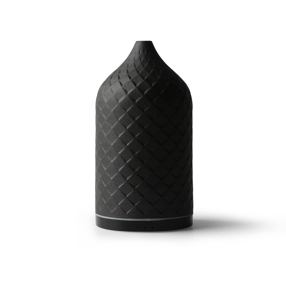 ZEIGGA LAB essential oil diffuser with ceramic top creates a calming atmosphere in any room.