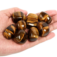 ZenQ tigers eye stones close-up showing shine and color bands.