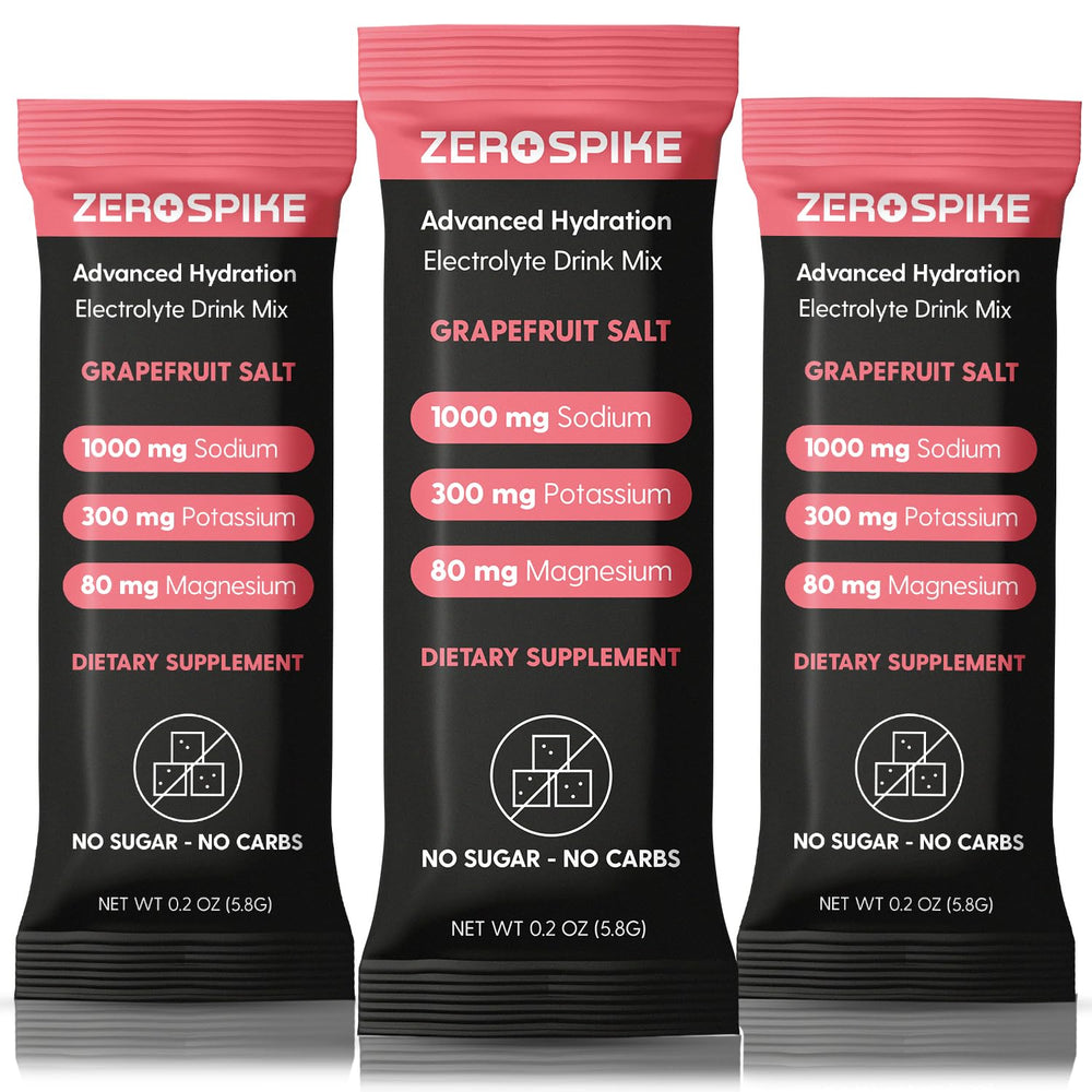 Zerospike No Sugar Electrolytes packets with grapefruit in a glass for quick hydration.
