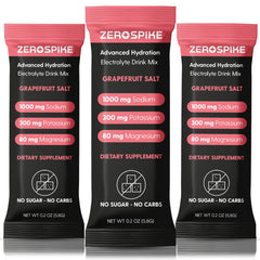 Zerospike No Sugar Electrolytes packets with grapefruit in a glass for quick hydration.