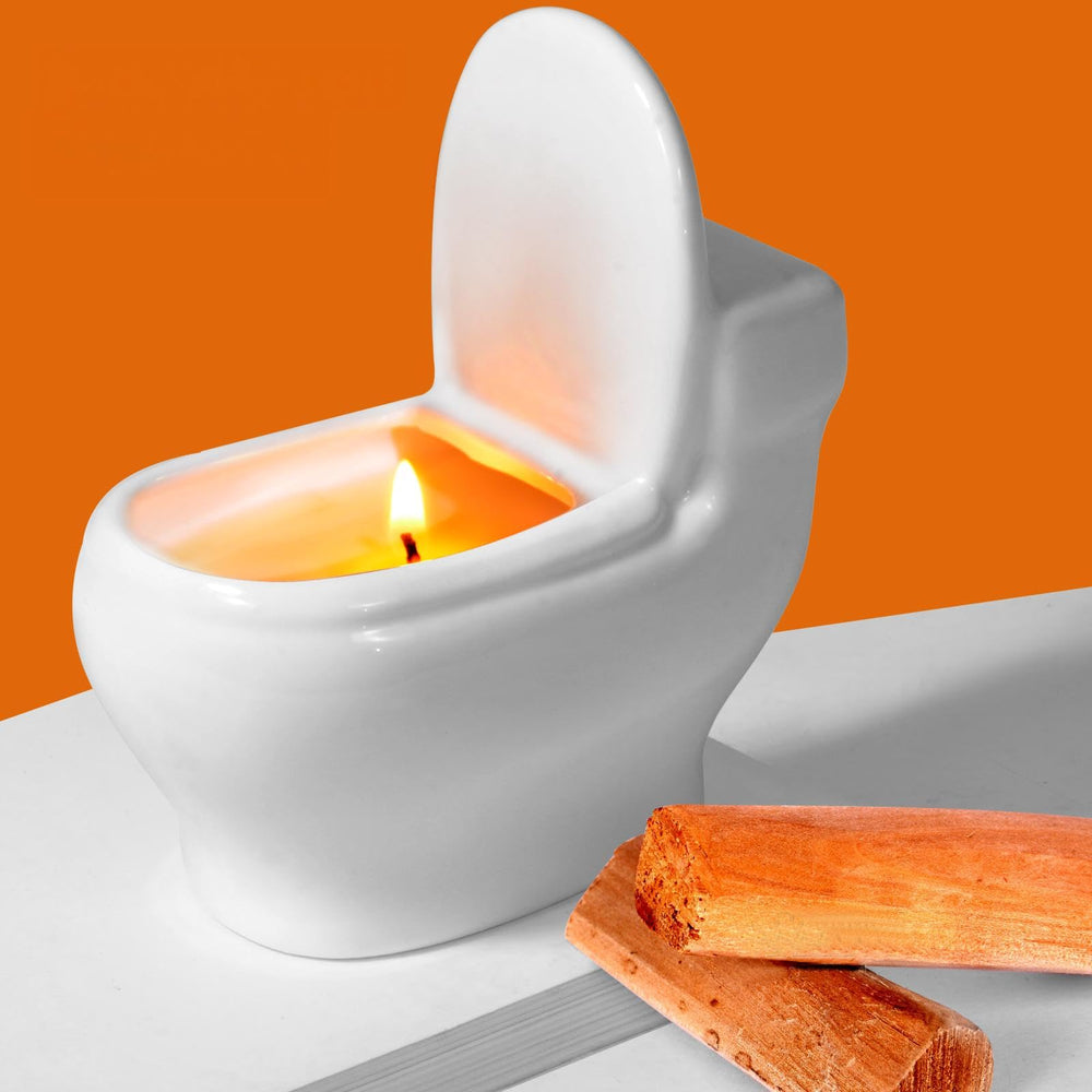 Zhanghe toilet-shaped candle with sandalwood scent enhances humor and ambient fragrance in any room.