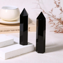 Zhiyuxi obsidian wand tip geometry highlights precise hexagonal point for energy work.