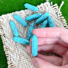 ZHIYUXI turquoise crystal point closeup highlighting natural texture and color