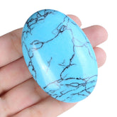ZHIYUXI turquoise palm stone held in hand for calm and balance