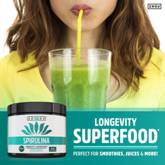 Powder dissolving in water to reveal a blue-green hue