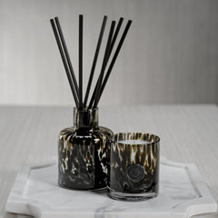 Zodax Apothecary Guild Black Fig Vetiver oil bottle enhances scent diffusion.