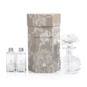 Zodax Grand Casablanca porcelain diffuser with flower design enhances living room ambiance.