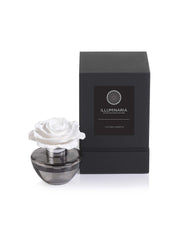 Zodax Illuminaria porcelain flower diffuser with glass bottle enhances room fragrance.