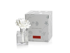 Zodax Seychelles porcelain flower detail enhances diffuser elegance and decor