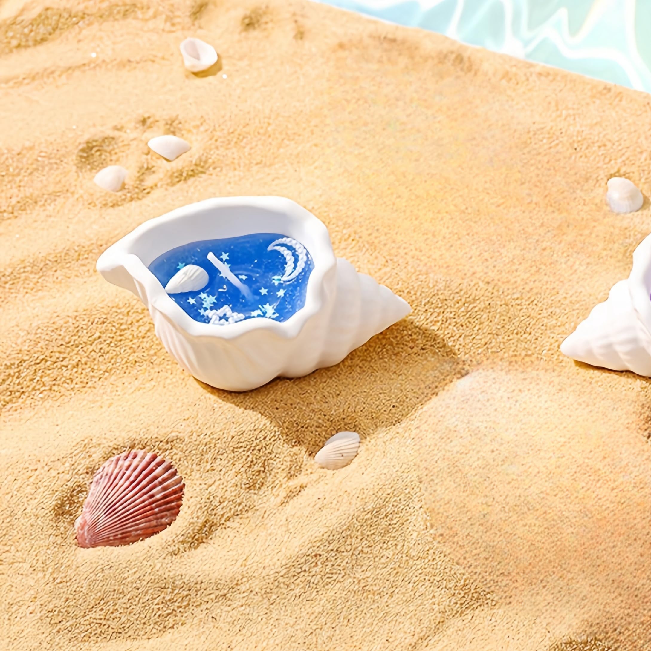 3-Wfinfing beach blue candle in glass container creates seaside mood