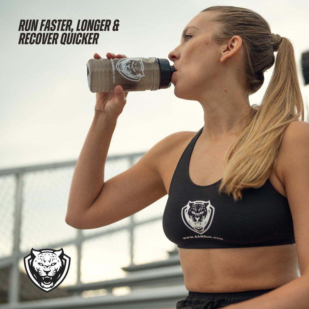 6AM Run Marathon peach mango tub conveying flavorful, low-jitter energy for cardio.