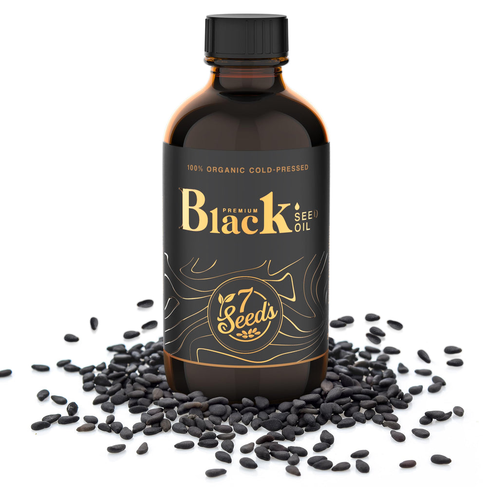 7 Seeds Black Seed Oil label closeup shows branding and ingredients.
