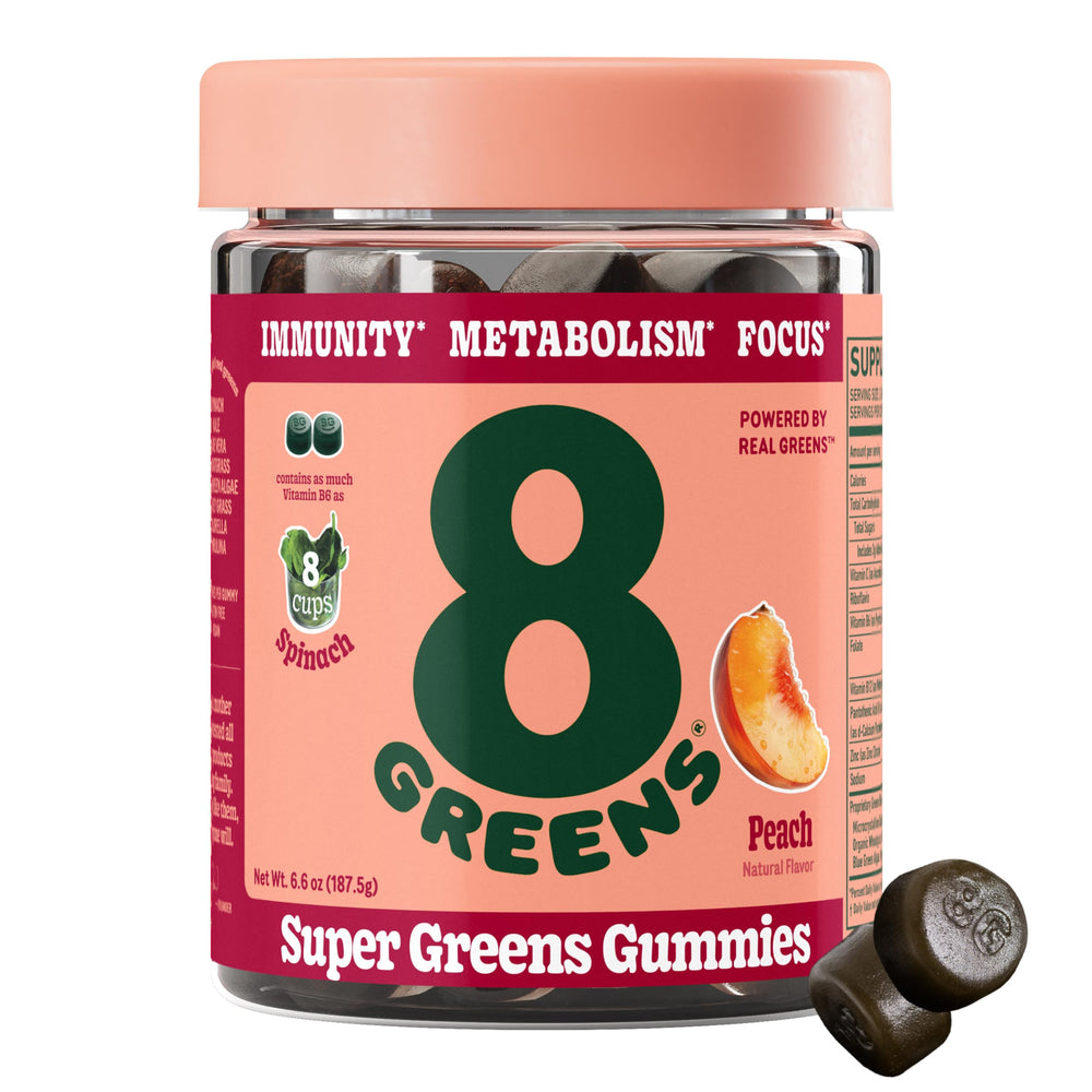 8Greens Supergreens Gummies bottle close-up highlighting peach flavor and daily nutrition.