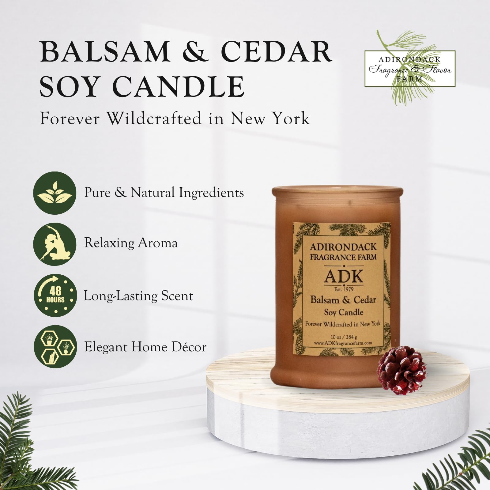 ADK Balsam & Cedar candle lit with warm glow for cozy evenings