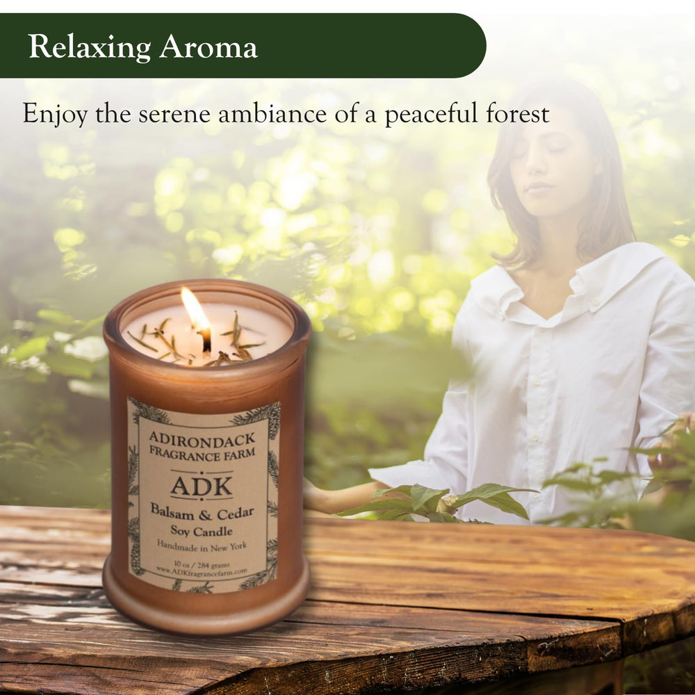 ADK Balsam & Cedar candle soft glow enhances a living room ambiance