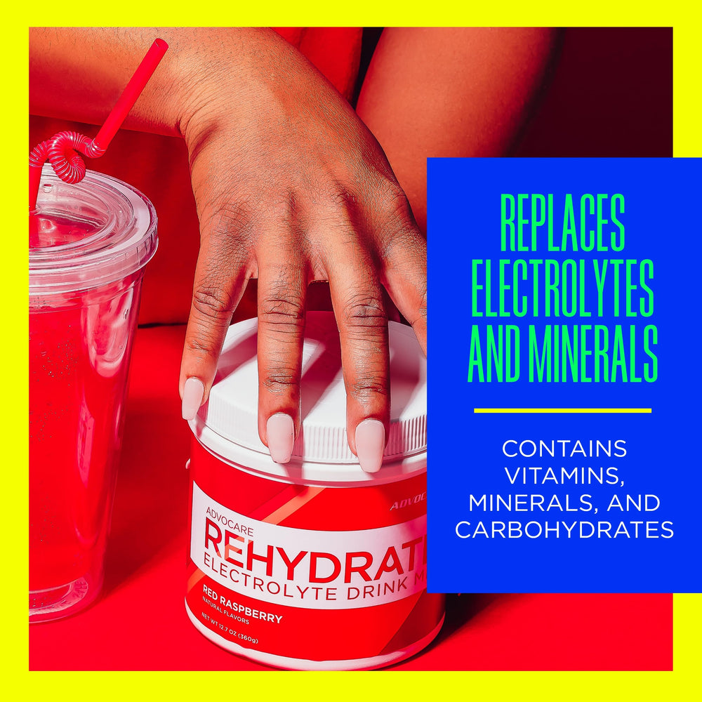 AdvoCare Rehydrate glass with raspberry drink ideal for pre- or post-workout hydration.