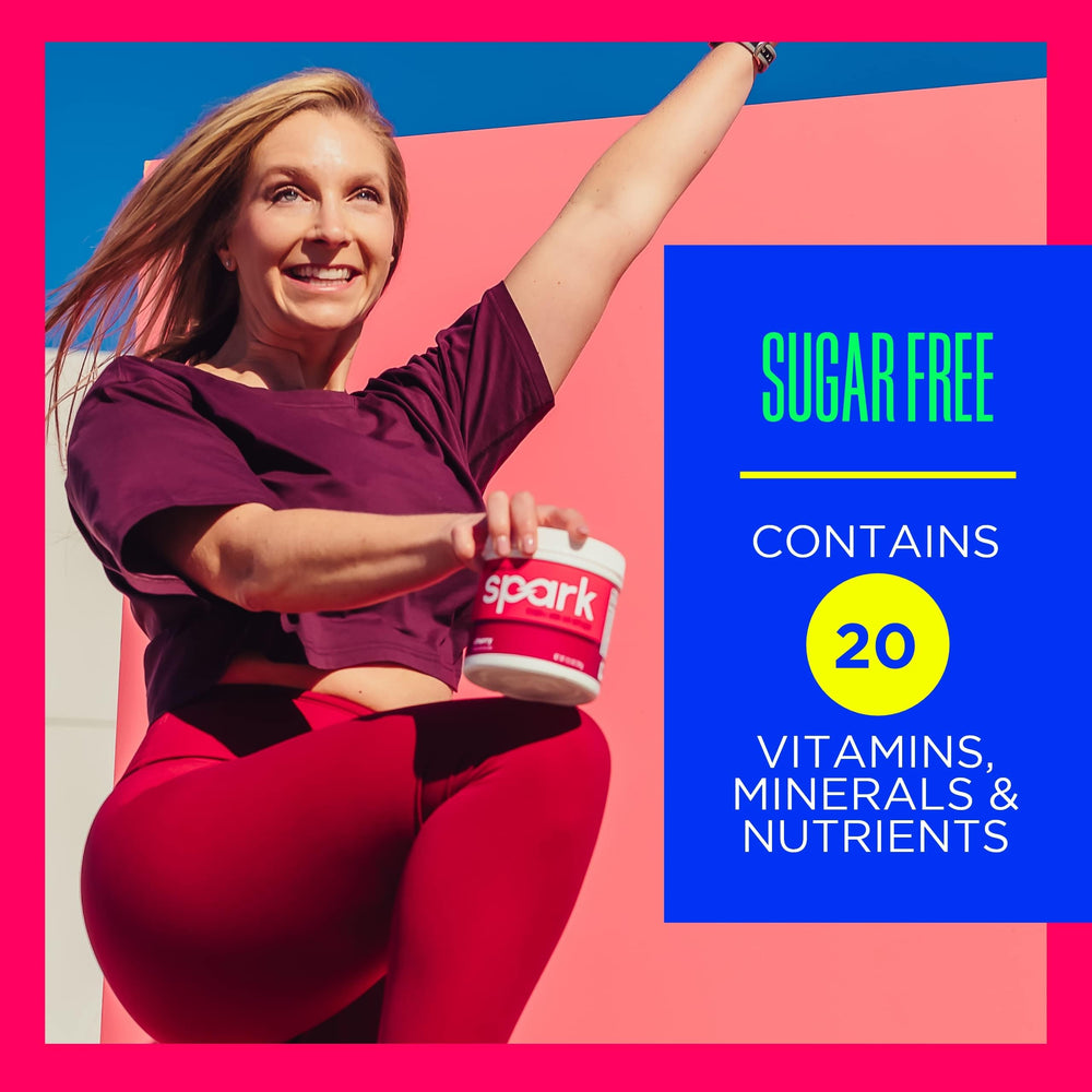 AdvoCare Spark Cherry prepared drink in a glass with vibrant color.