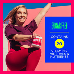 AdvoCare Spark Cherry prepared drink in a glass with vibrant color.