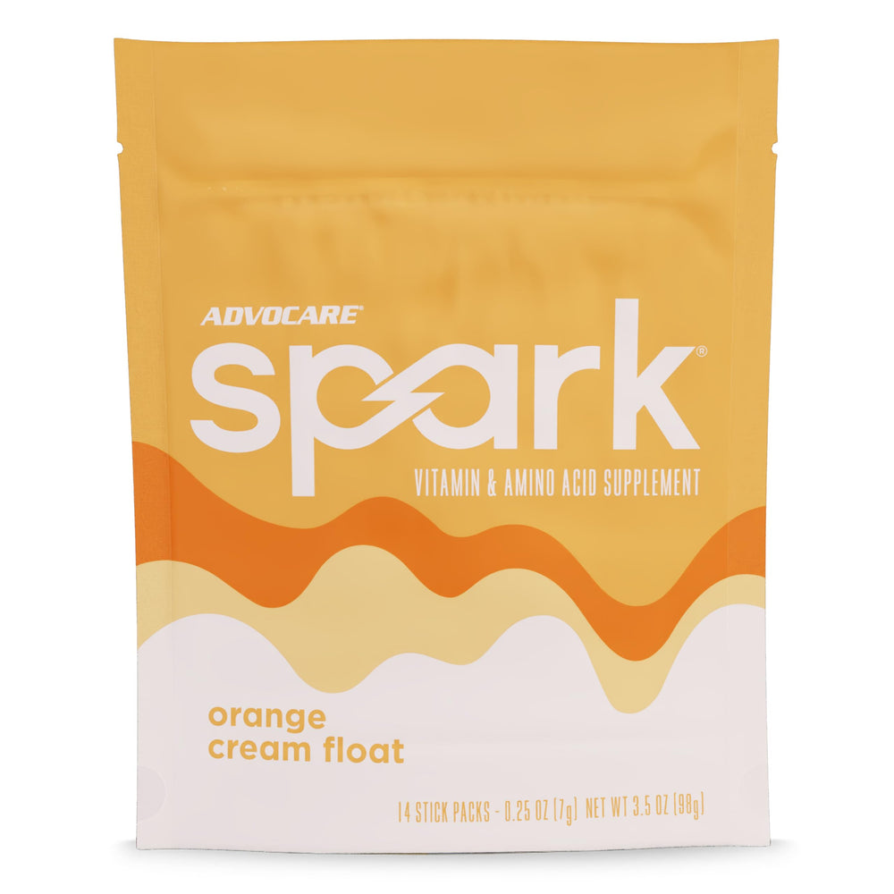 AdvoCare Spark orange-cream stick pack closeup for convenient energy on the go.