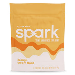 AdvoCare Spark orange-cream stick pack closeup for convenient energy on the go.