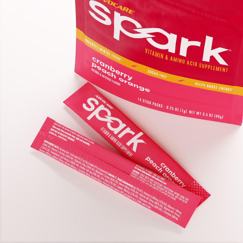 AdvoCare Spark powder dissolving in water for smooth energy without crash.