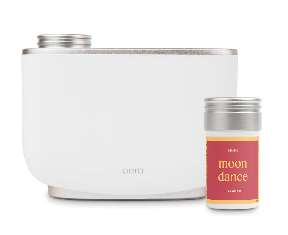 Aera diffuser smart top view shows compact, discreet placement for any room.