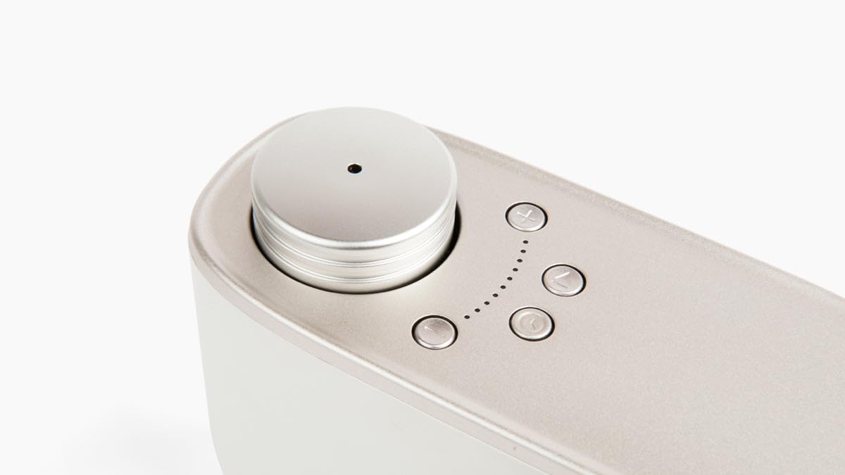 Aera diffuser top view showcases clean lines that blend with decor.