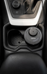 Aera Go diffuser showing ten-level fragrance control in car